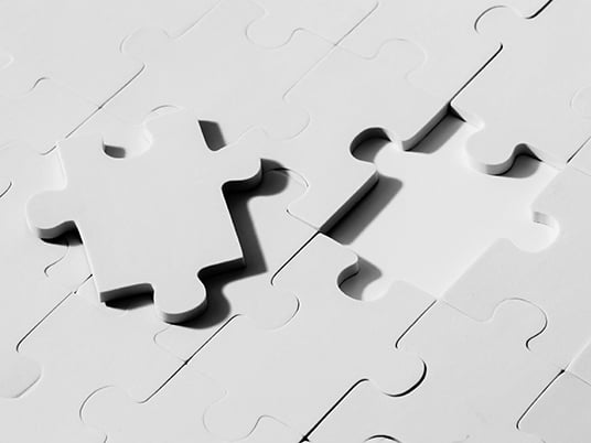 Empty and blank missing piece of jigsaw in white color background - business strategy and thinking solving problem concept